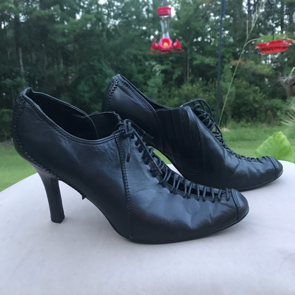 Black leather spike heels